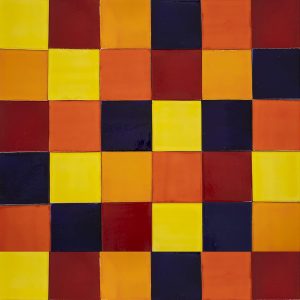 Mosaicos lisoa de colores primarios hechos a mano.